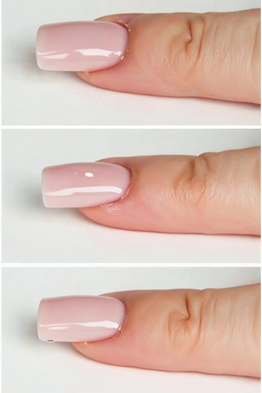 Coral pink acrylic fill at home on almond-shaped nails with a smooth finish