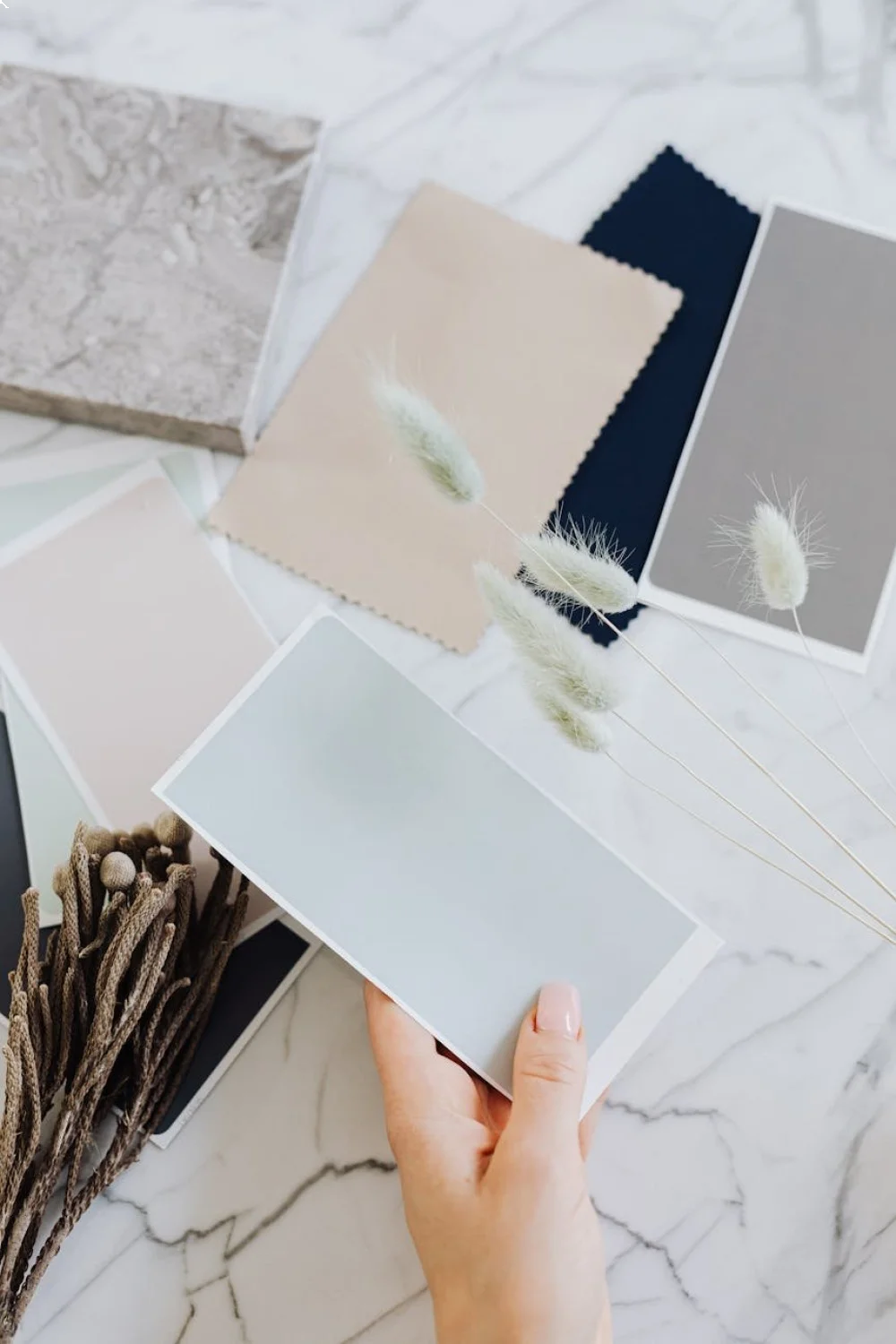 Swatches of early summer colors arranged from spring pastels transitioning to summer brights