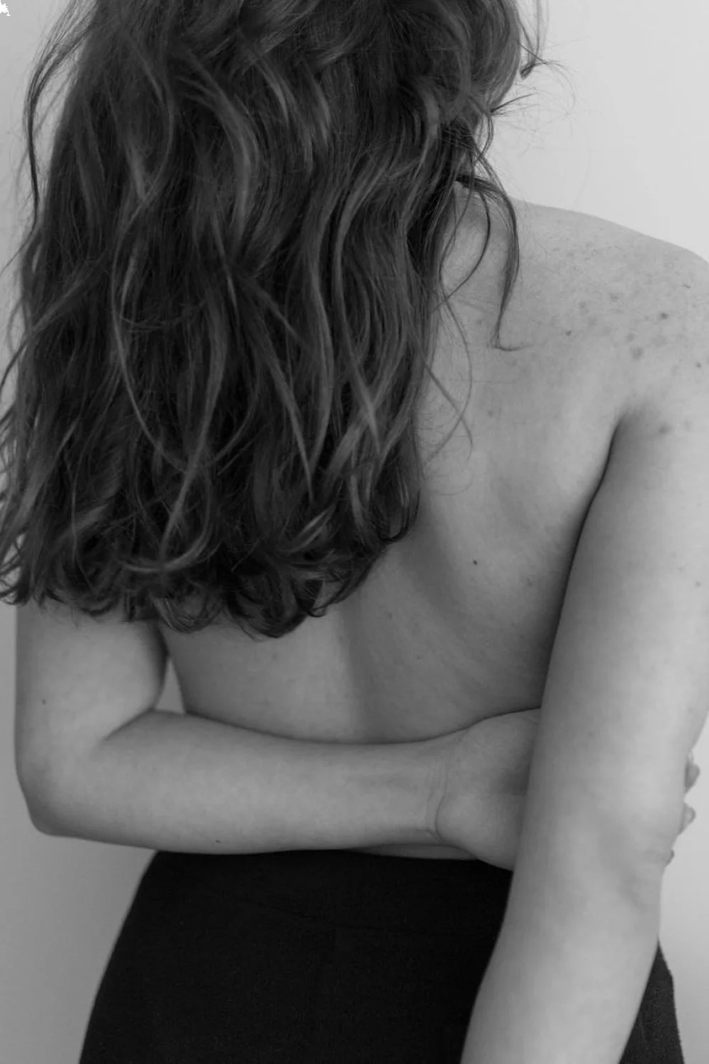 Step-by-step progress shots showing bare nail, base coat, white tip application, and finished result