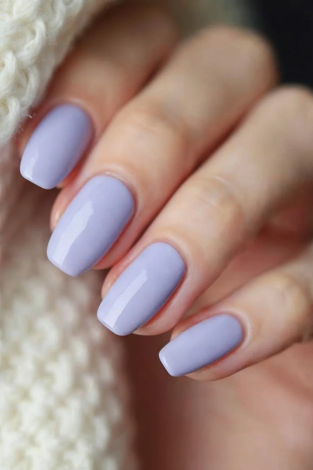 Pale lavender nails with a gradient finish from glossy cuticle to matte tip showcasing matte nail designs
