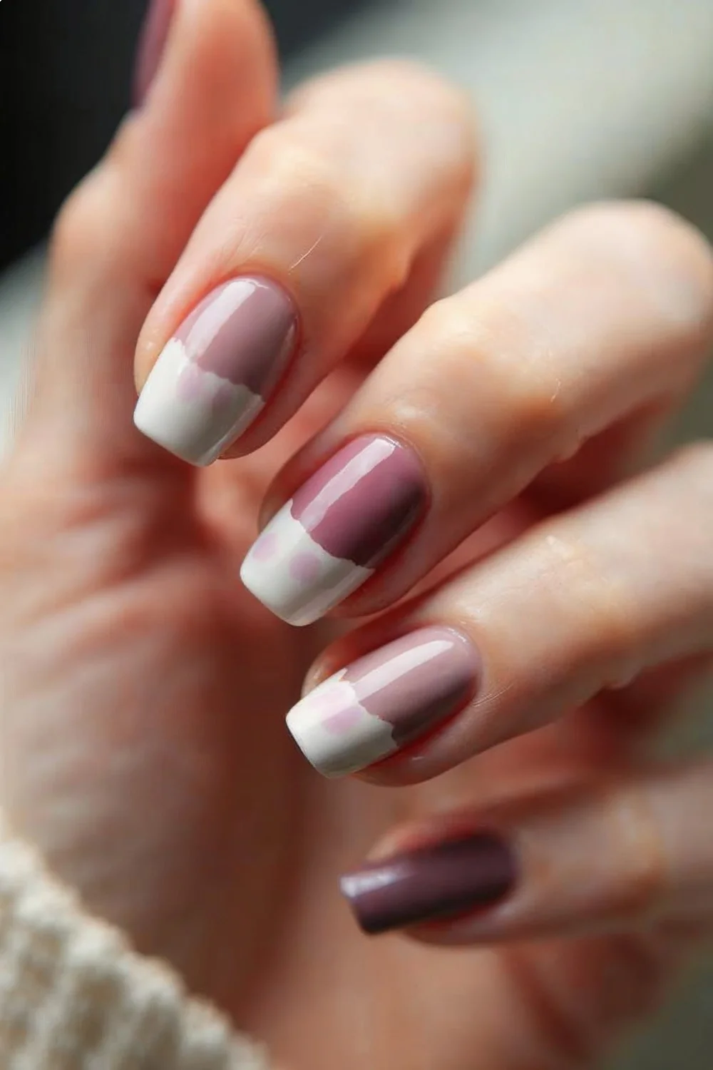 coral pink and white tonal blocking design on matte nails versus glossy finish