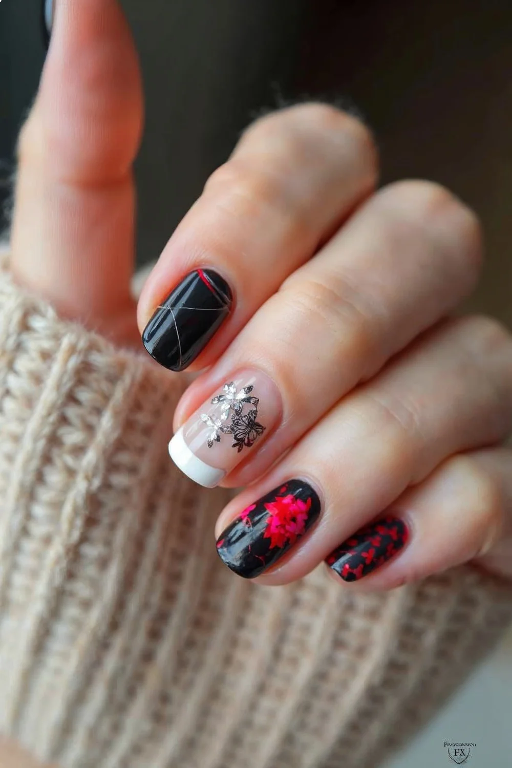 Round nail shape featuring minimalist line art, coral pink French tips, and busy geometric patterns in black and red