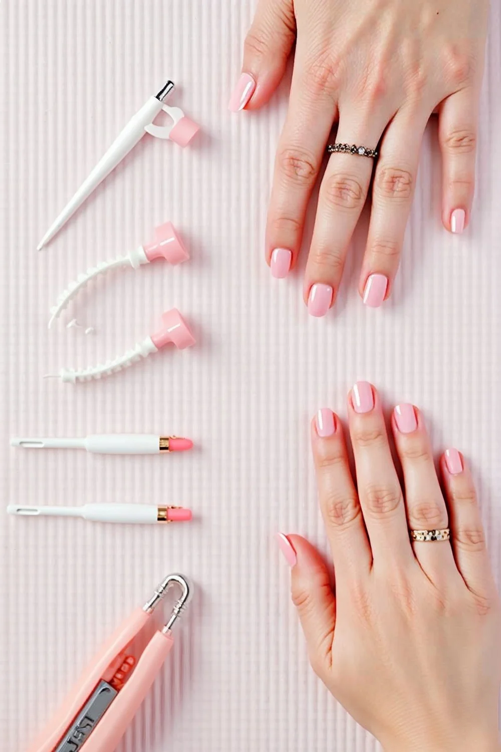 Flat lay showing nail prep tools arranged in order of use, with clean natural nails ready for gel application