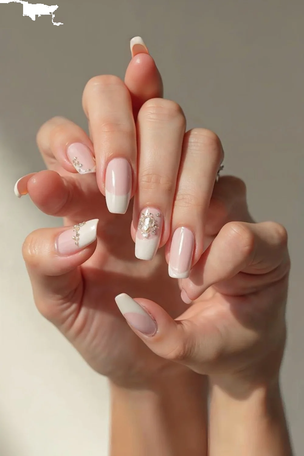 Coral pink French tips with gold accents on almond nails on different skin tones showcasing wedding nails